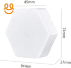 White hexagonal object with dimensions 84mm by 74mm by 27mm and 45mm on top