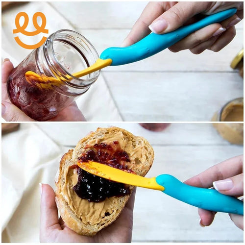 Blue and yellow spreader scooping jam from jar and spreading jam on peanut butter toast
